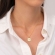 Κολιέ excite fashion jewellery με κρεμαστό ανάγλυφο μοτιφ στολισμένο με λευκά κρυσταλάκια και ένα μώβ στο κέντρο από επιχρυσωμένο ασήμι 925 K-123-AS-MOB-G-10