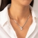 Κολιέ απο επιπλατινωμένο ανοξείδωτο ατσάλι, αλυσίδα φίδι με λευκό οβάλ κρύσταλλο, της Excite Fashion Jewellery. N011-S-65