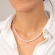 Κολιέ με πέρλες και κρεμαστό επιχρυσωμένο σταυρουδάκι, από ασήμι 925 της Excite Fashion Jewellery. K-41-G