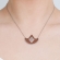 Modern short necklace with leaf design pendant made of platinum plated stainless steel. N-59-044S