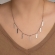 Short necklace with pendants, black beads made of stainless steel. Available in Silver, gold, rose gold colors. N-89-057S