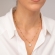Κολιέ Excite fashion jewellery με λευκό ματάκι και αλυσίδα από επιχρυσωμένο ατσάλι με μπίλιες. K-1600-01-17-59