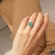 Φαρδύ δαχτυλίδι Excite fashion jewellery, διάτρητο με dots στολισμένο με  πράσινη πέτρα από ανοξείδωτο ατσάλι. R-69-48-2-S