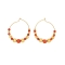 Σκουλαρίκια Excite fashion jewellery κρίκοι, με κοραλί και  επίχρυσες χάντρες. S-1600-01-22-82